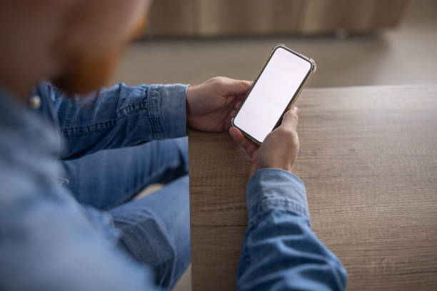 istock Unrecognizable man having a video call on his mobile phone 1369721434