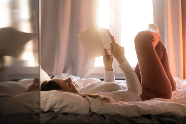 istock Woman writing in her journal diary 1369721518