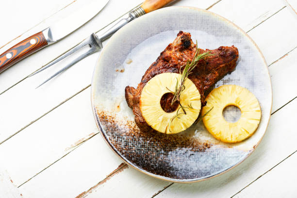 istock Meat baked with pineapple rings. 1369725159