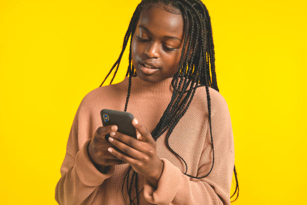istock Teenager on her phone 1369726128