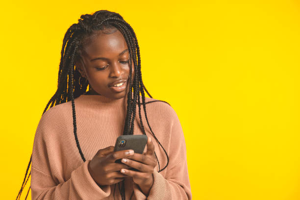 istock Teenager on her phone 1369726136