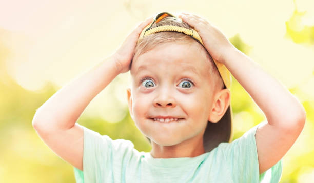 istock the boy  in surprise 1369726523