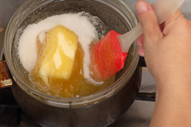 istock Bain-marie with sugar, butter and honey on saucepan 1369730821