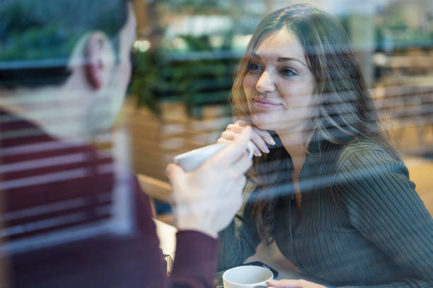 istock Caucasian couple enjoying cafe date for afternoon tea 1369737796