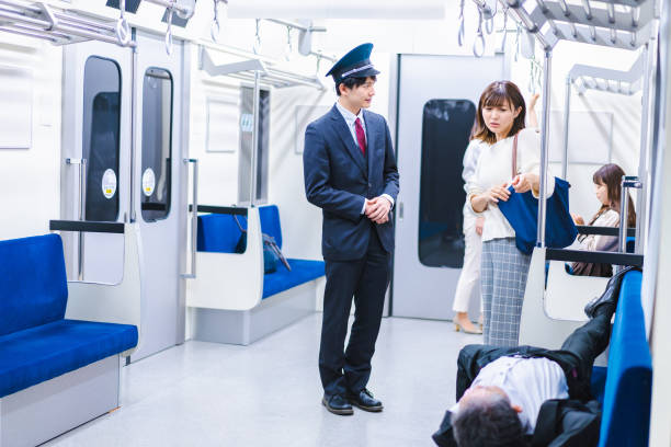 istock A conductor calls out to a fallen passenger on a train 1369737816
