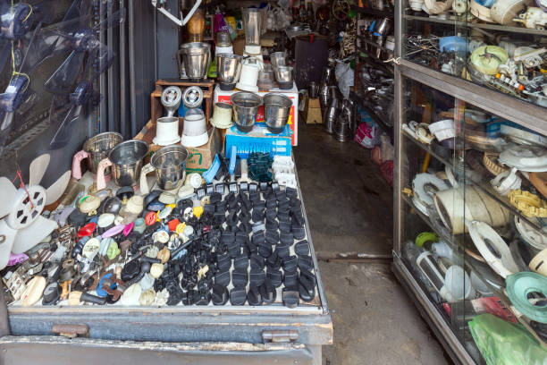 Belgrade, Serbia - April 06, 2024: Second Hand Clothing Bags Shoes Old Radio Lamp Toys for Sale at Flea Market Kalenic in Capital City.