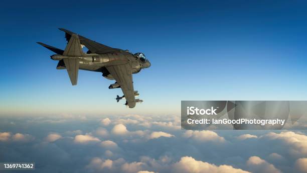 3d Rendering Of A Military Fighter Jet Flying High Above The Clo Stock Photo - Download Image Now