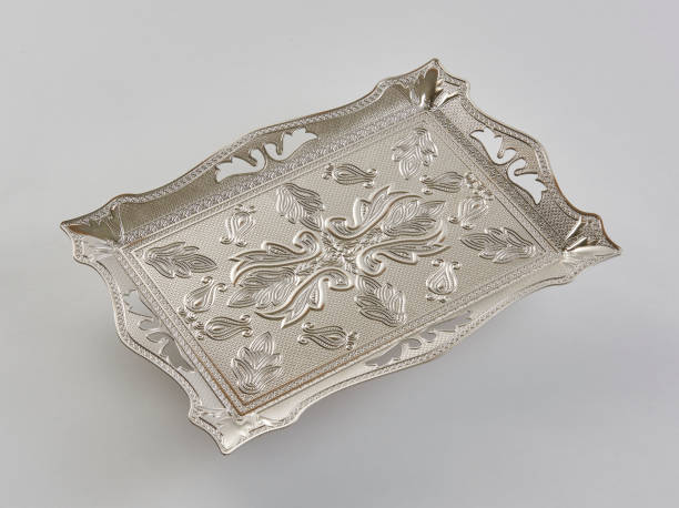 istock Gold and silver tray, zinc handmade white background isolated style. 1369750486