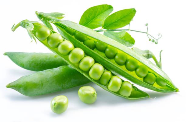 istock Perfect green peas in pod isolated on white background. 1369752134