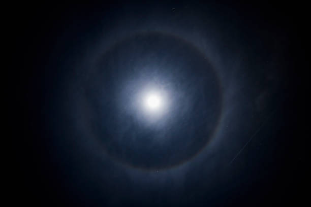 istock landscape with full moon halo on a winter night 1369752413