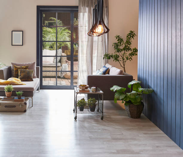 istock Modern room sofa and empty parquet floor for carpet design, home background, lamp frame, garden view outdoor house concept interior style. 1369752654