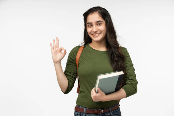 istock university student in white background, stock photo 1369753823