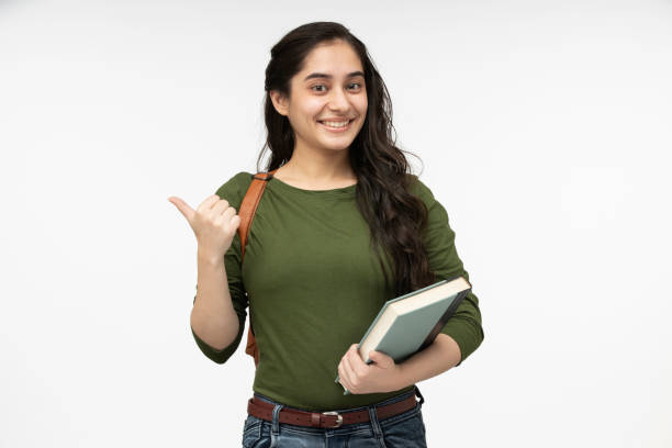 university student in white background, stock photo - pointing women cheerful front view imagens e fotografias de stock