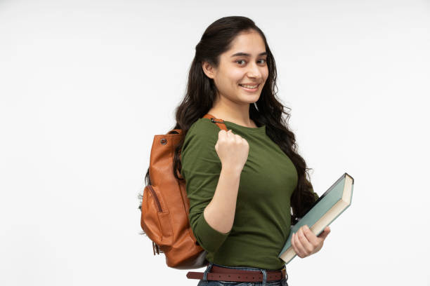 istock university student in white background, stock photo 1369754279