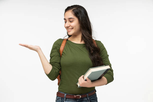 istock university student in white background, stock photo 1369754327