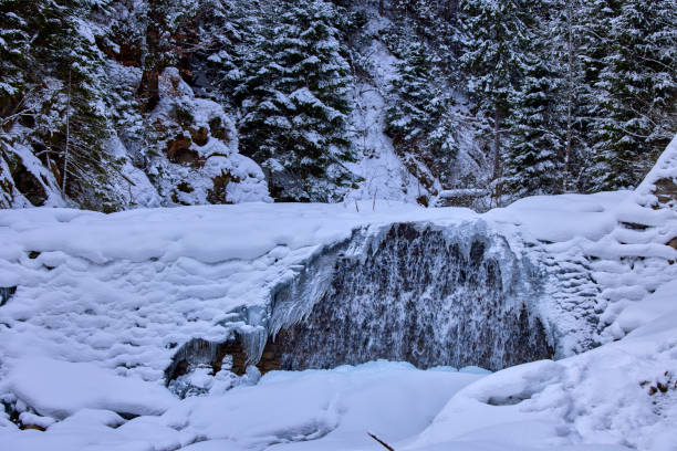 istock winter images with a mountain river. idyllic landscape 1369755847