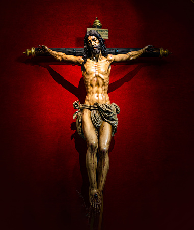 Jesus christ on the cross at Santa Maria la Blanca church in Seville, Spain