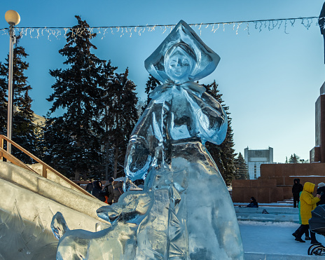 Chelyabinsk, Russia - January 05, 2021. An ice sculpture stands on a square in the city center.