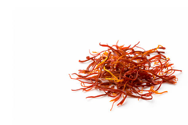 Small pile of saffron on a white background stock photo