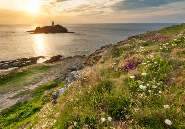 istock Godrevy Head and Lighthouse at sunset,with dramatic sky,Cornwall,United Kingdom. 1369761703