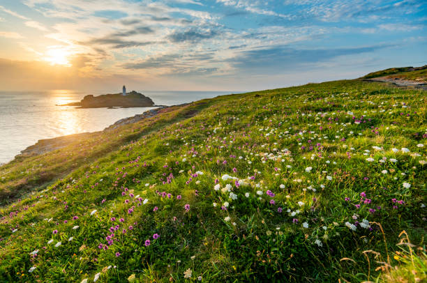 istock Godrevy Head and Lighthouse at sunset,with dramatic sky,Cornwall,United Kingdom. 1369761706