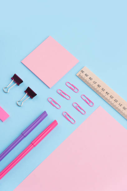 istock Office supplies on the blue background table 1369764691