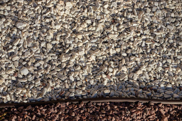 istock small bright pebbles and gravel as background or texture 1369767219