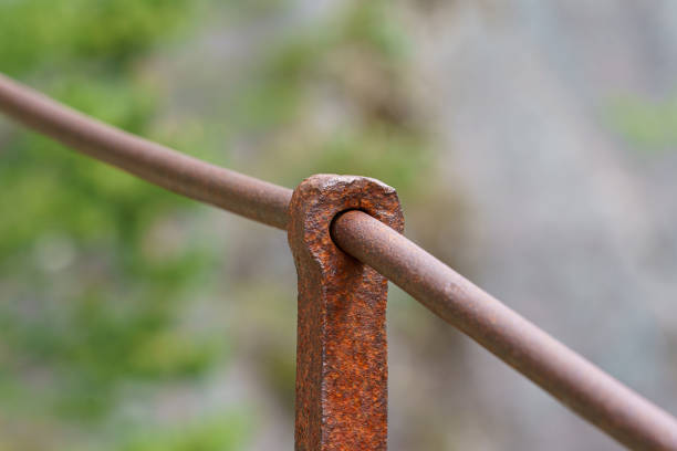 A heavy duty lifting chain box or pulley hoist, industrial lifting equipment object. Close-up and selective focus at the part.