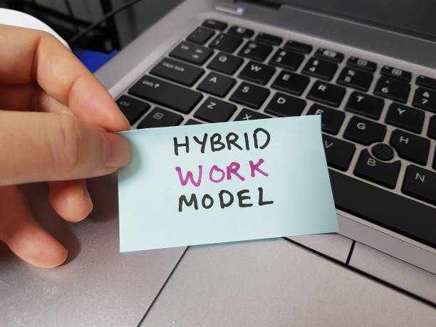 istock Hybrid work model. Hybrid workplace during covid-19 pandemic 1369769181