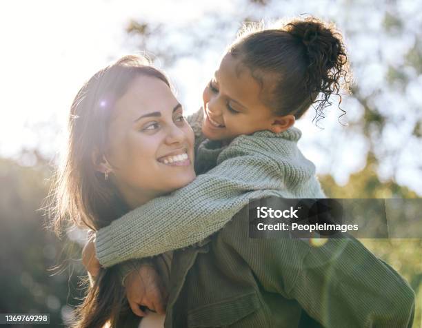 Shot Of A Young Mother And Daughter Spending Time At A Park Stock Photo - Download Image Now