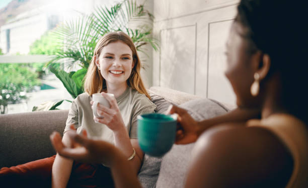 istock Shot of two friends catching up over coffee 1369772520