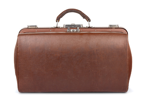 Brown leather brief case on a white background.