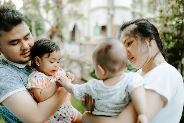 asian couple with their child