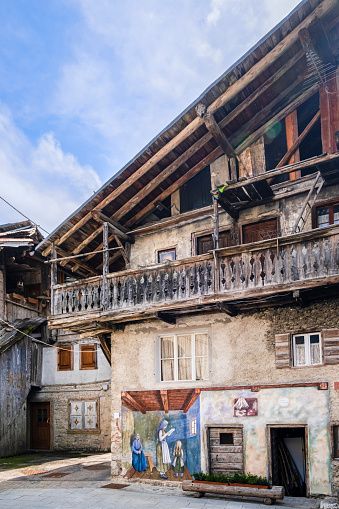 Murals on the walls of the ancient houses of Cibiana di Cadore, a mountain town in the province of Belluno and in the heart of the Dolomites
