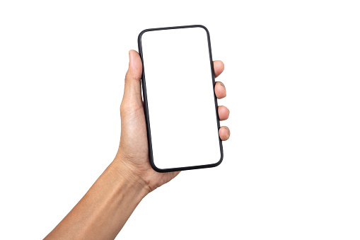 Hombre de negocios de la mano que sostiene el teléfono inteligente móvil con la pantalla en blanco aislada sobre fondo blanco con la trayectoria de recorte photo