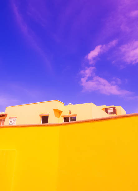 istock Minimalist architecture stylish wallpapers. Trendy colours combination. Yellow and blue. Geometry and details 1369775885