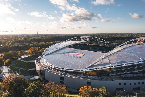 Leipzig, Saxony, Germany - October 2021: Aerial sunset view over Red Bull Arena, home stadium of football club RB (Red Bull) Leipzig
