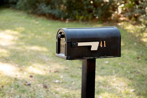 LV American style mailboxes on the side of road. stock photo