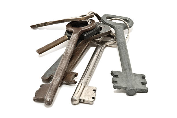 istock Bunch of old rusty keys, isolated on white background 136977888