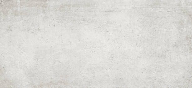 istock Natural stone texture banner. Gray marble, matt surface, granite, ivory texture, ceramic wall and floor tiles. Rustic Natural porcelain stoneware background high resolution. Limestone pattern 1369785443