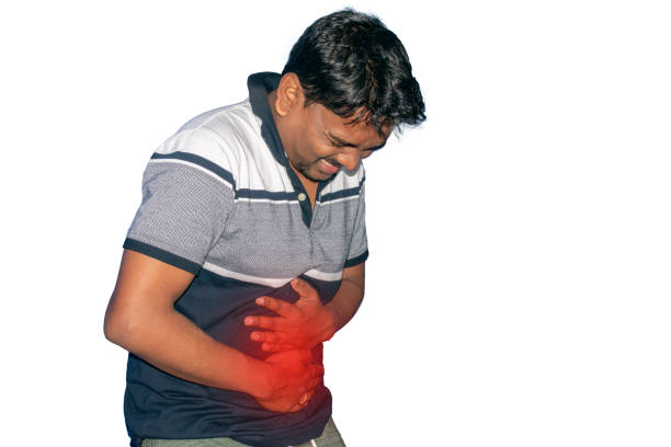 hindus trzymający brzuch w bólu, na białym tle z przestrzenią kopii. ból brzucha i inne koncepcje chorób żołądka. - norovirus diarrhea gastroenteritis virus zdjęcia i obrazy z banku zdjęć