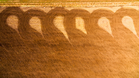pattern on a harvest field from a tractor harvesting