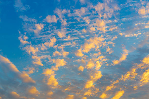 istock Clouds and yellow sky,The sun shining through low cloud,sunrise with clouds, light rays and other atmospheric effect 1369787203