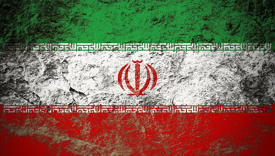 Islamic Republic of Iran flag on grunge stone background