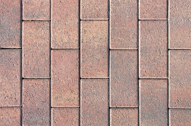 istock Texture of stone paving. Paved footpath. Abstract background 1369791564