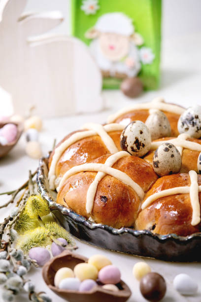 istock Homemade Easter traditional hot cross buns on ceramic dish 1369795125
