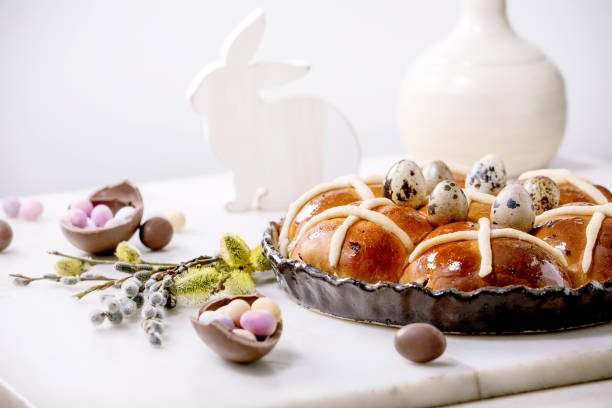 istock Homemade Easter traditional hot cross buns on ceramic dish 1369795141