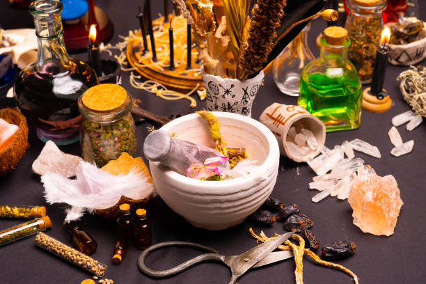 istock Mortar and pestle witchcraft alchemy still life selective focus, witch craft pharmacy and medicine. Spiritual occultism chemistry, magic alchemy and ritual arrangement. 1369795821