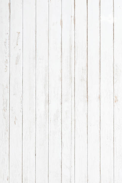 istock White gray wood color texture horizontal for background. Surface light clean of table top view. Natural patterns for design art work and interior or exterior. Grunge old white wood board wall pattern 1369797982