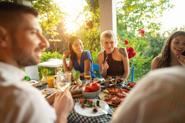 istock Caucasian friends enjoying the summer brunch 1369799232